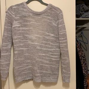gray and white open back sweater